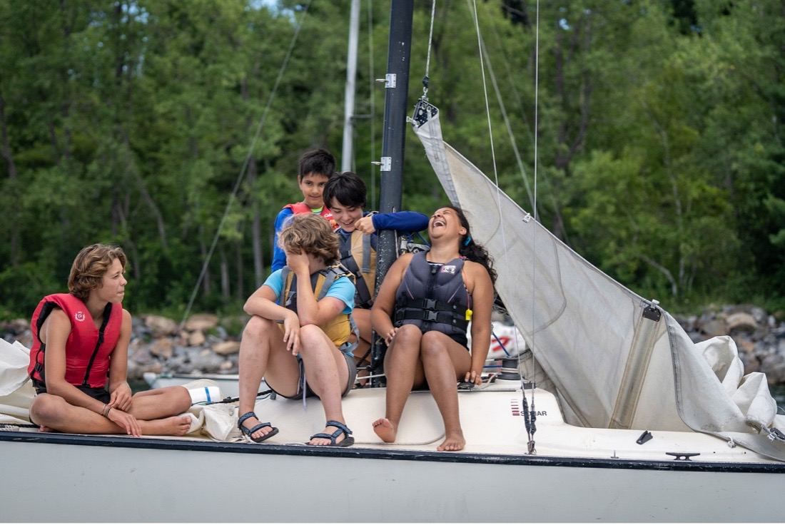 Children learning to sail